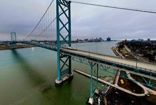 Website Design in Windsor Ontario by Asian Web Developers featuring Ambassador Bridge skyline view