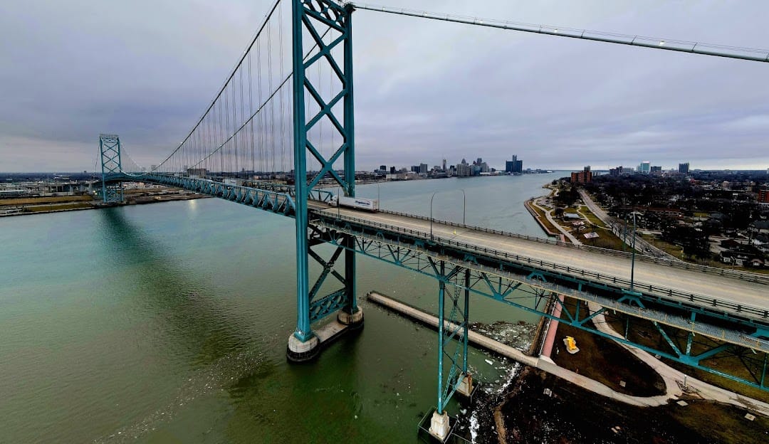 Website Design in Windsor Ontario by Asian Web Developers featuring Ambassador Bridge skyline view